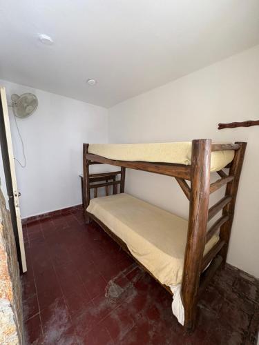 a room with two bunk beds in it at Jujuy Hostel in San Salvador de Jujuy