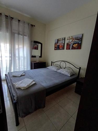 Postel nebo postele na pokoji v ubytování Sea Apartment