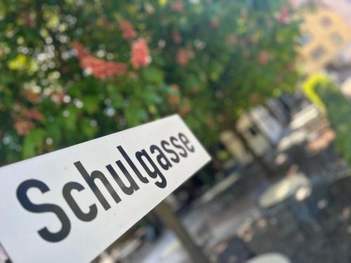 a sign with the word schlitzgrass on it at Groasmückle Apartment in Tauberbischofsheim