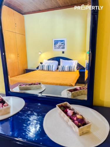 Ένα ή περισσότερα κρεβάτια σε δωμάτιο στο Boutique Seaside Studios #PROPERTLY