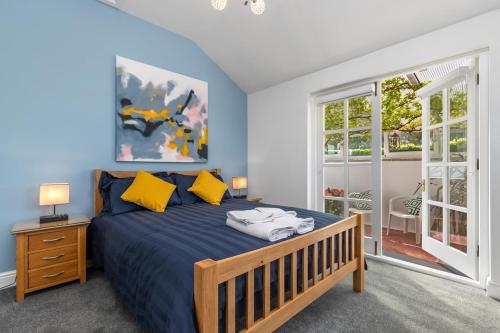 Ένα ή περισσότερα κρεβάτια σε δωμάτιο στο Southwood Cottage Newgale