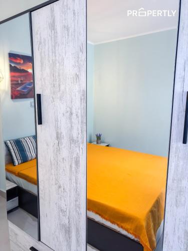 Ένα ή περισσότερα κρεβάτια σε δωμάτιο στο Boutique Seaside Studios #PROPERTLY