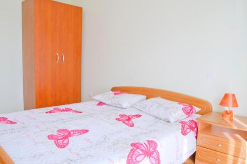 Ένα ή περισσότερα κρεβάτια σε δωμάτιο στο apartman leo