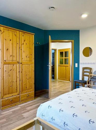 Postel nebo postele na pokoji v ubytování Ferienhaus Am Koog Fahretoft