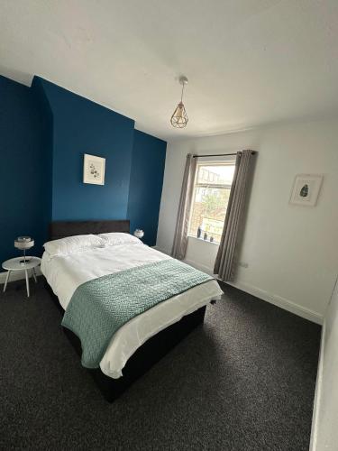Ένα ή περισσότερα κρεβάτια σε δωμάτιο στο Entire home in Stoke-on-Trent