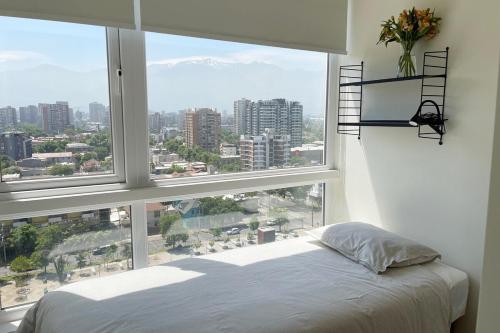 Postel nebo postele na pokoji v ubytování Suite Barrio Italia