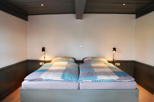 Ένα ή περισσότερα κρεβάτια σε δωμάτιο στο Ferienhaus Nele Emmelsbüll-Horsbüll