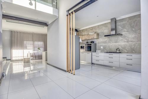 Φωτογραφία από το άλμπουμ του Urban Nest Retreat σε Roodepoort