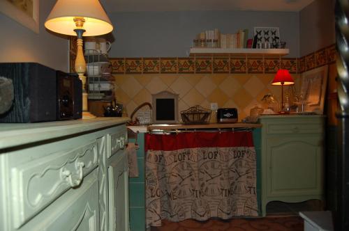 Dapur atau dapur kecil di Chambres d'Hôtes Le Clos Du Verger