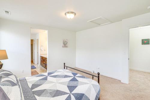 a bedroom with a bed in a room at 9 Mi to Downtown SLC Peaceful Home with Pool Access in North Salt Lake