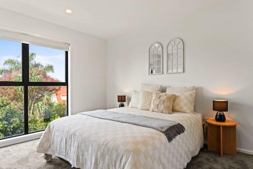 Ένα ή περισσότερα κρεβάτια σε δωμάτιο στο Stunning Mount Albert 2 Bed