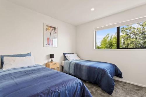 Postel nebo postele na pokoji v ubytování Trendy 2 Bed Accommodation