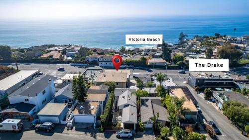 an aerial view of a town with the ocean at Penthouse Steps from Victoria Beach 180 degree ocean views in Laguna Beach
