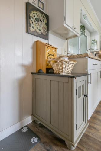 a kitchen with a counter with baskets on it at Cozy Carolina in Fayetteville