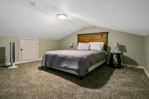 a bedroom with a large bed in a room at Haymount Hideaway in Fayetteville