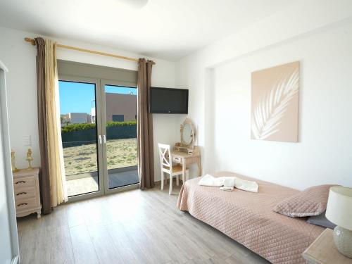 Ένα ή περισσότερα κρεβάτια σε δωμάτιο στο Bianca luxury house