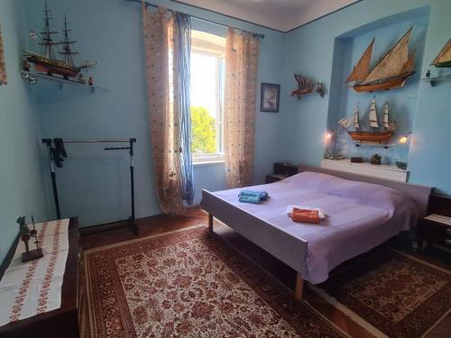 Posteľ alebo postele v izbe v ubytovaní Villa Rose Apartment