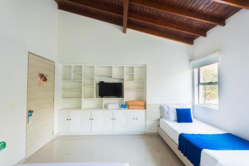 TV a/nebo společenská místnost v ubytování Hotel Suite del Parque