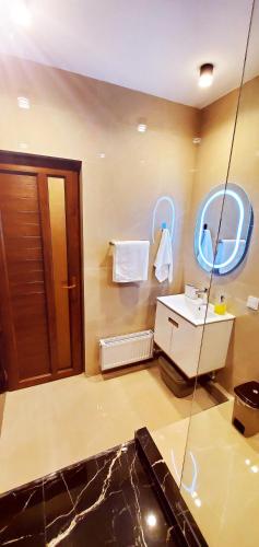Un baño de Уют