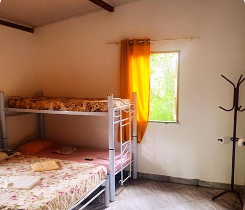 Postel nebo postele na pokoji v ubytování Pousada Pé na Trilha