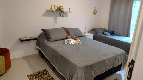 Ένα ή περισσότερα κρεβάτια σε δωμάτιο στο Casa Cremerie Suites