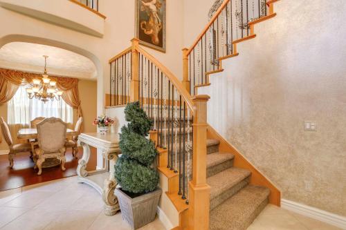 a home with a staircase and a dining room at 2 Mi to Old Town Temecula Elegant SoCal Home in Temecula