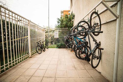 a group of bikes parked against a fence at Your Sophisticated Retreat in Las Condes in Santiago
