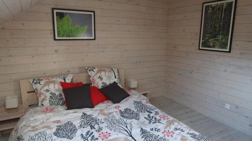 Katil atau katil-katil dalam bilik di Chalet des Aigrettes, Les 1000 Etangs