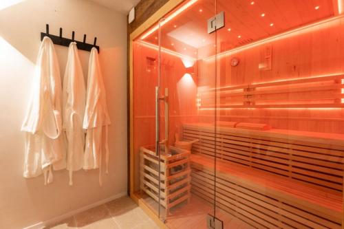 Ένα μπάνιο στο L'Auberge - Appartement 3 chambres avec sauna