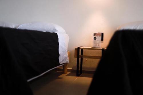 Postel nebo postele na pokoji v ubytování Hotel Caminos