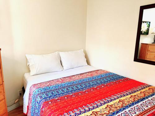 Postel nebo postele na pokoji v ubytování Peachland Beach Resort