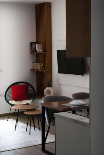 TV a/nebo společenská místnost v ubytování SeaScape Apartment