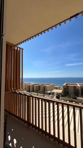 a balcony with a view of the ocean at Whisky Green Coast Hotel & Apartments in Palasë