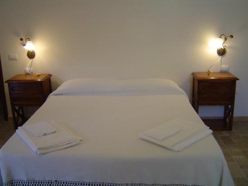 Ліжко або ліжка в номері L' Antico Casale