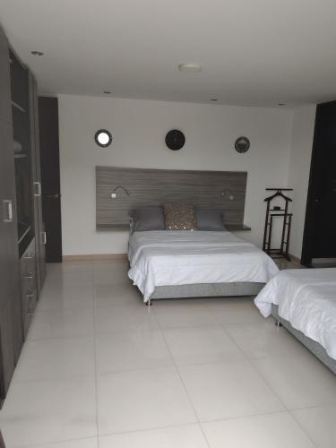 Ένα ή περισσότερα κρεβάτια σε δωμάτιο στο Hotel PREMIUM HOUSE