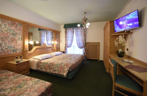 Postel nebo postele na pokoji v ubytování Hotel Barance