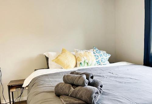 a stuffed animal on a bed in a bedroom at 5 STAR ROOM AT BEST LOCATION IN RICHMOND HILL-Walking Plaza, Malls,Train in Richmond Hill