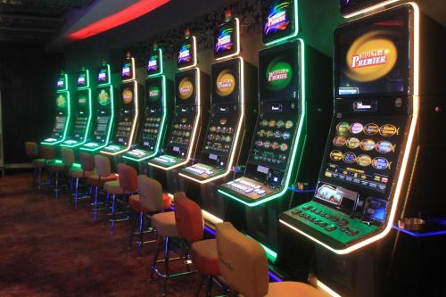 a row of slot machines in a casino at Djibouti Palace Kempinski in Djibouti
