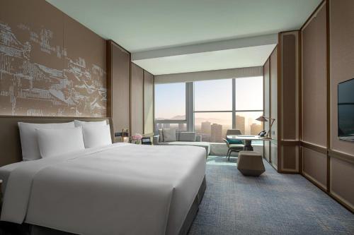 Kempinski Hotel Nanjingにあるベッド