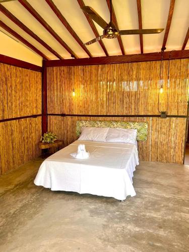 Postel nebo postele na pokoji v ubytování Finca Hotel Doradal