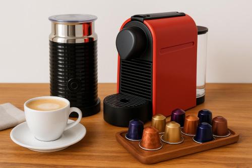 a coffee maker and a cup of coffee on a table at TheAretsouPlace, Luxury Apartment in Kalamaria, 200m from the Sea with Parking in Thessaloniki