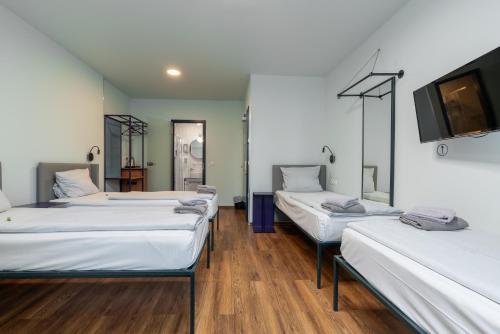 Postel nebo postele na pokoji v ubytování Das Schreder Hotel