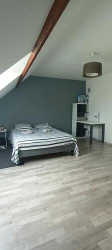 Ένα ή περισσότερα κρεβάτια σε δωμάτιο στο Chambre circuit des 24 heures