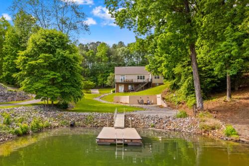 an aerial view of a lake with a house at Castaway Cove -Lake Norman Waterfront Home with Private Dock in Denver