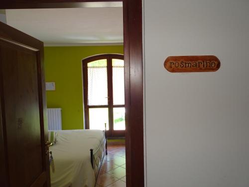 Кровать или кровати в номере La Vecchia Stalla B&B