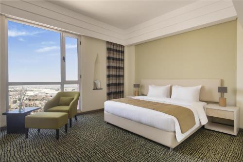 Katil atau katil-katil dalam bilik di Bristoria Hotel Erbil