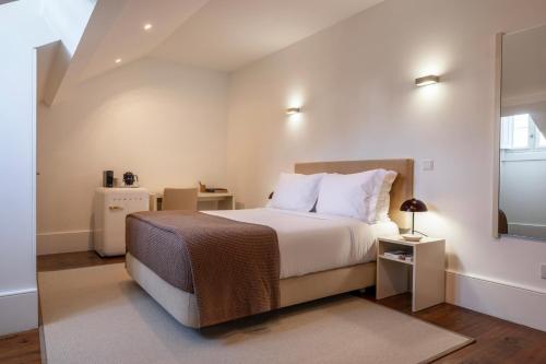 Postel nebo postele na pokoji v ubytování Oporto Comfort Charming Cedofeita
