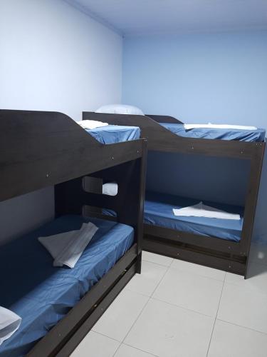 Postel nebo postele na pokoji v ubytování Casa de Temporada Ceu e Mar