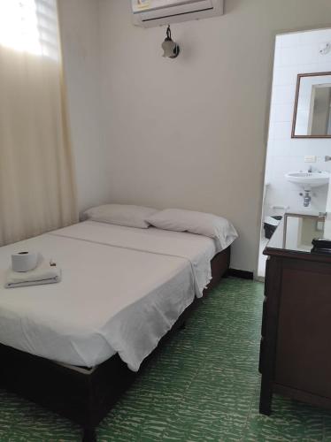 Hotel Casa Opiaにあるベッド