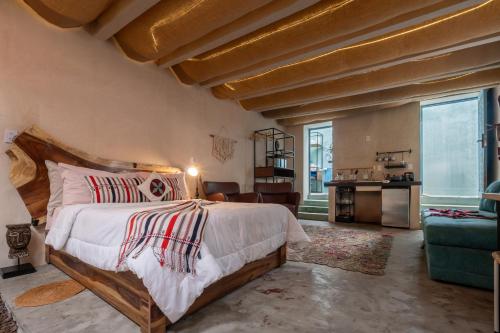Ένα ή περισσότερα κρεβάτια σε δωμάτιο στο Loft colonial en Teotihuacan